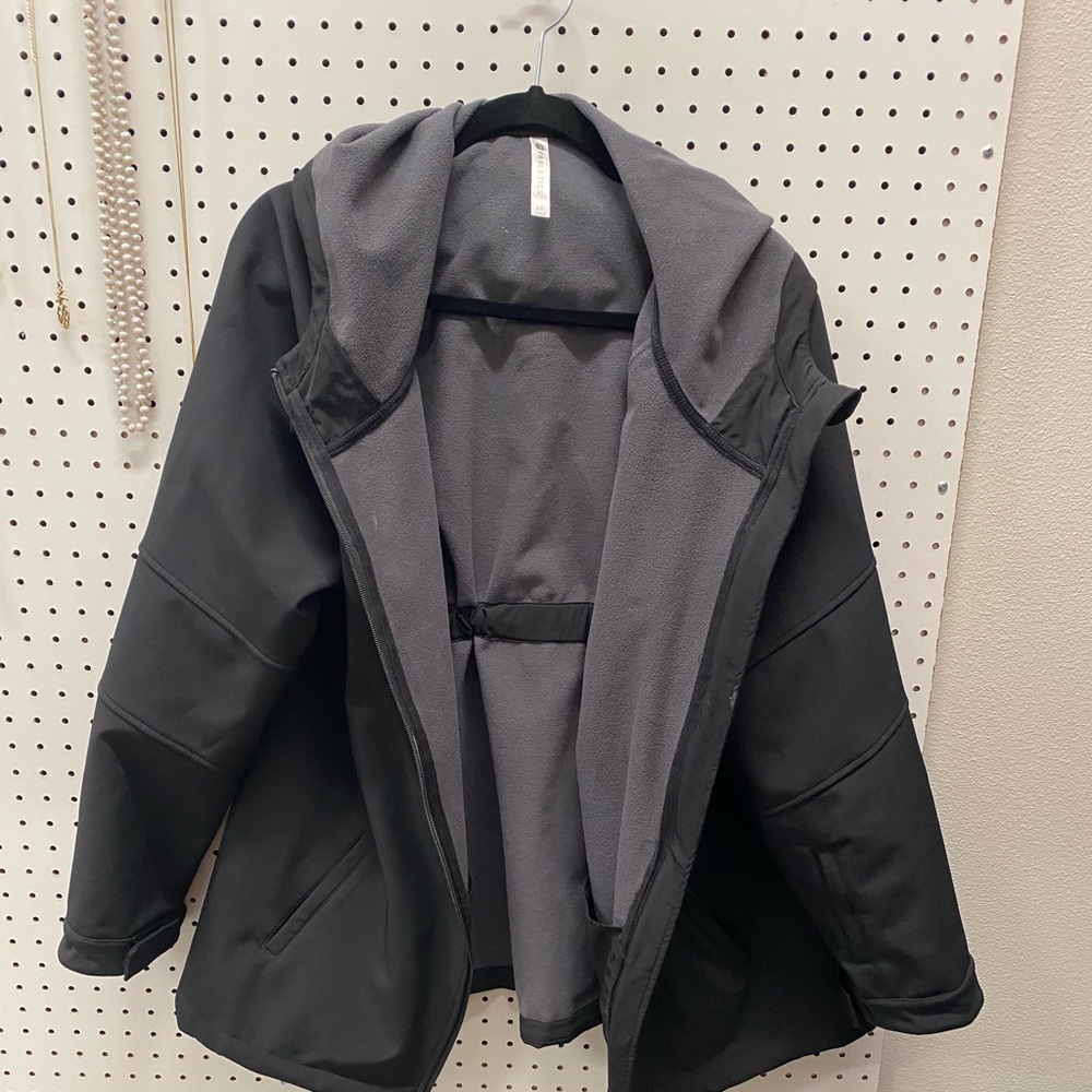 A Fabletics black jacket.